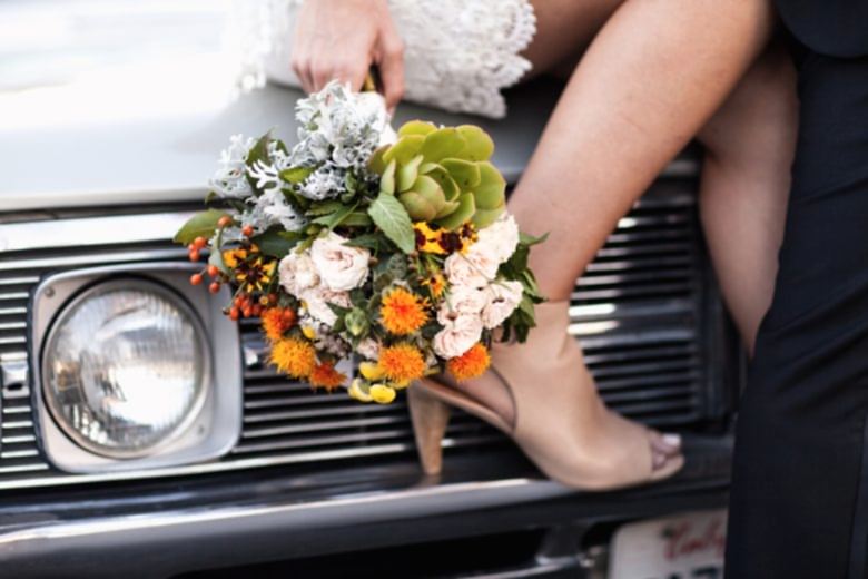 bride holding bouquet of flowers