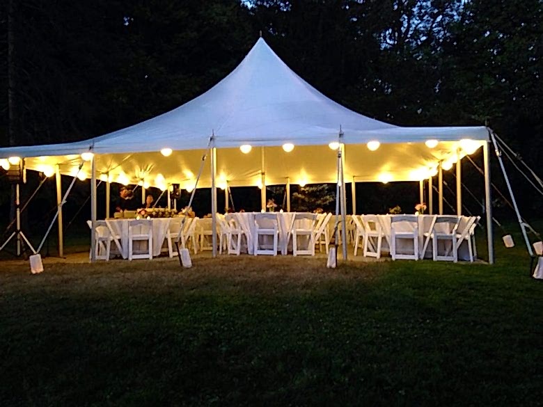 Open sided wedding tent at night
