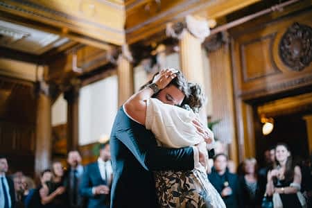 a son and his mom dancing to a mother son dance songs