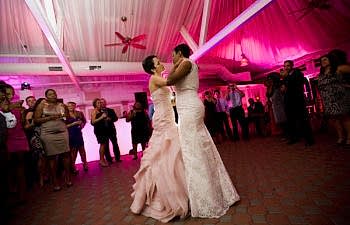 Two brides dancing their first dance