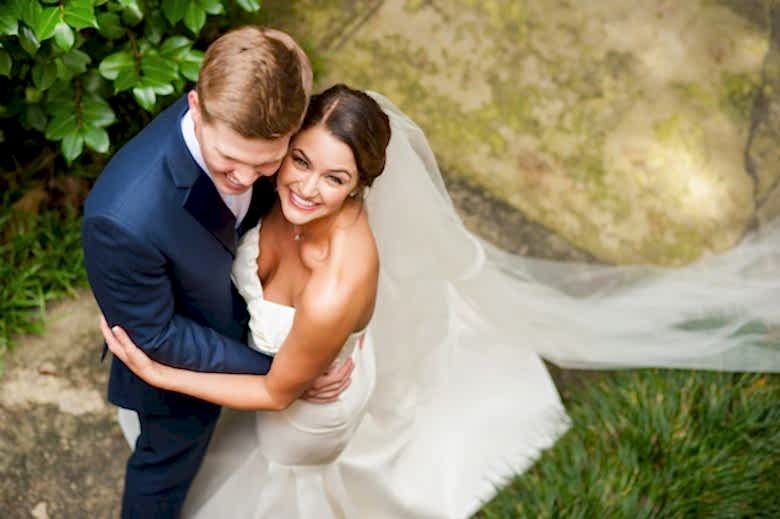 bride and groom smiling on their wedding day