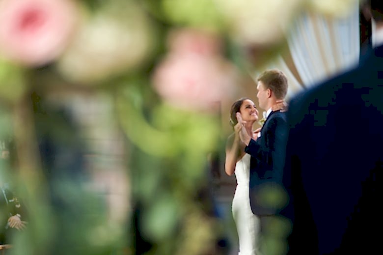 smiling bride and groom during first dance