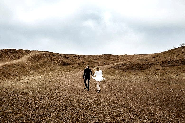 Bride and groom walking together