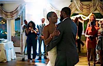 A couple dances their first dance