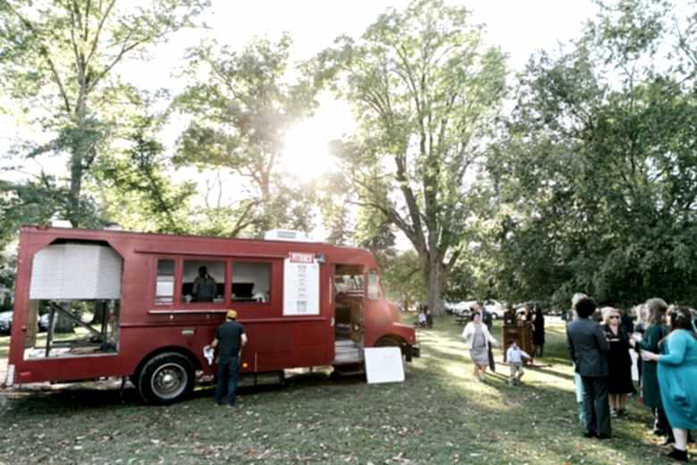 wedding guests outside food truck