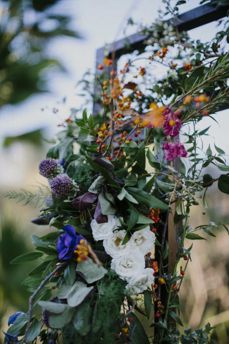 flowers on wedding arch
