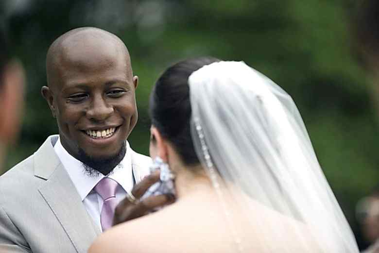close up of groom during wedding ceremony
