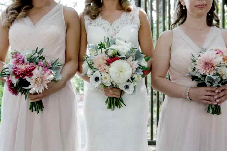 bridesmaids standing together