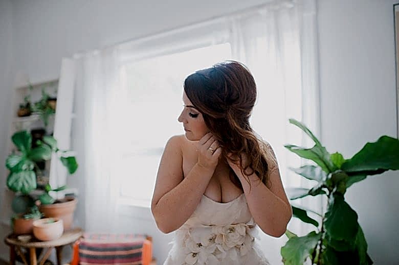 bride getting ready on wedding day
