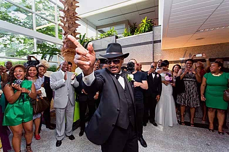 man in fedora dancing