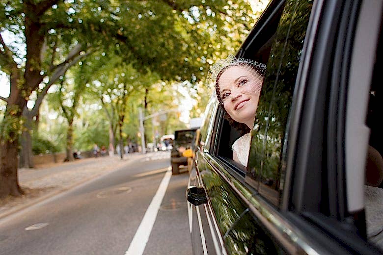 bride looking out limo window