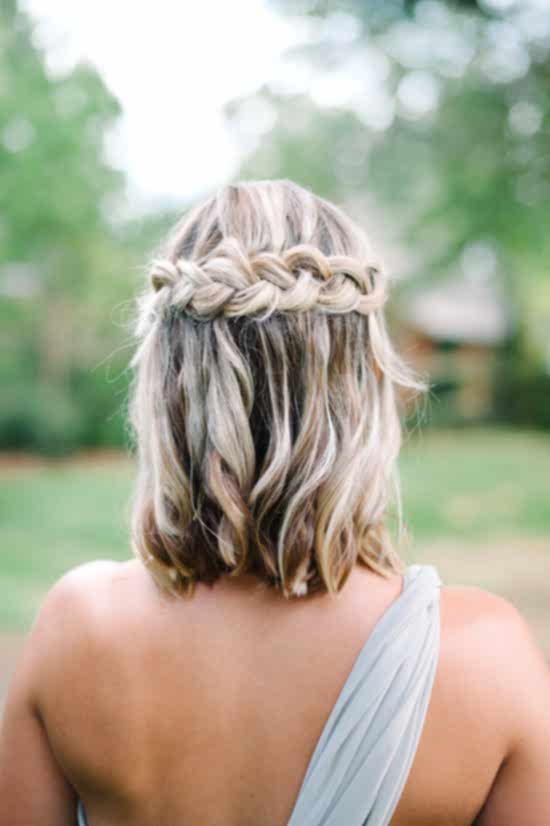 medium hair half up half down braided bridesmaid hairstyle