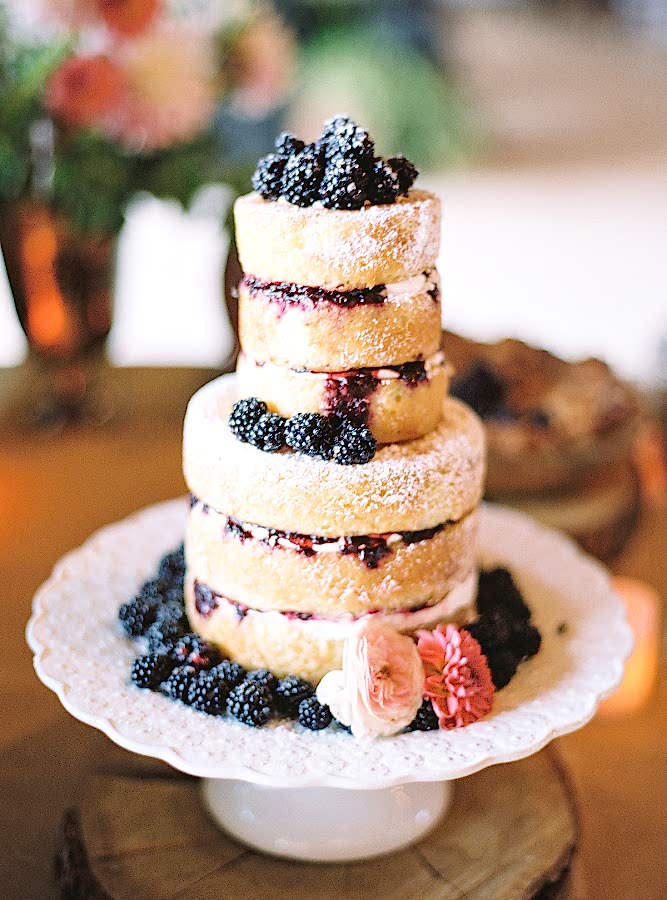 Naked cake covered in blackberries