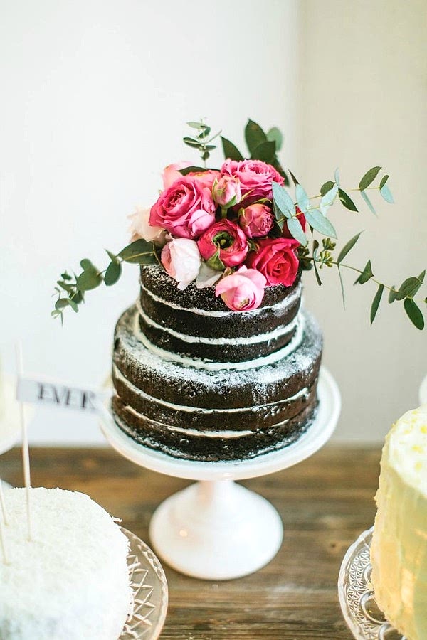 chocolate cake with powdered sugar and roses