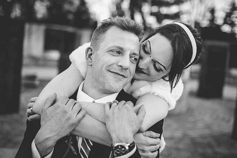 couple together on their wedding day
