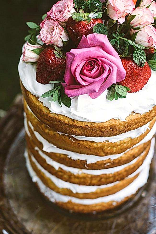 bohemian cake with flowers and strawberries