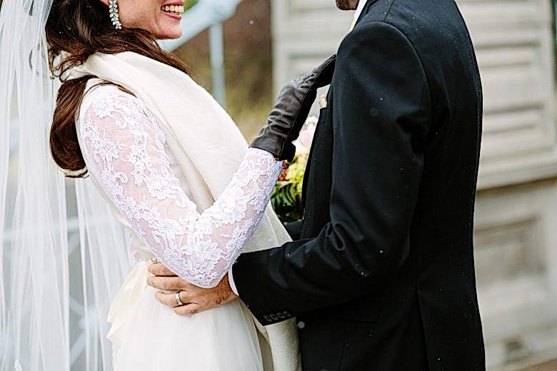 bride and groom in the snow