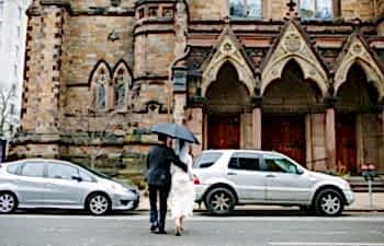 bride and groom walking to venue