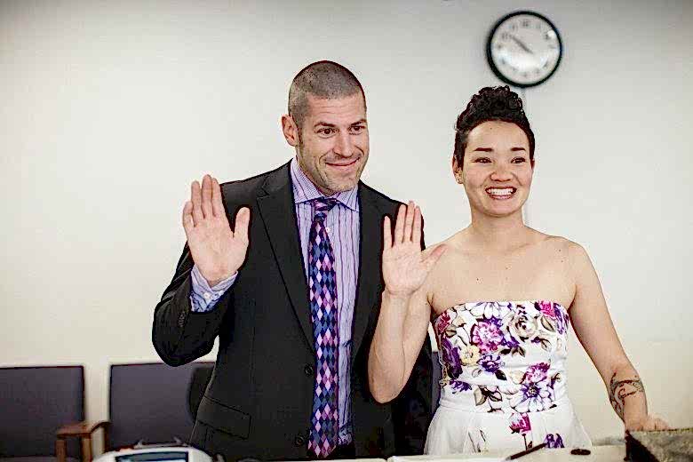 bride and groom eloping at city hall