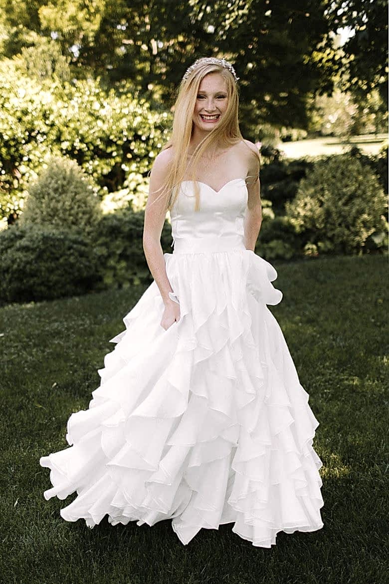 bride wearing the new lace and liberty wedding line
