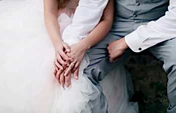 bride and groom sitting together