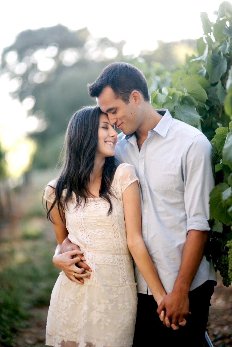 man and woman standing together in love