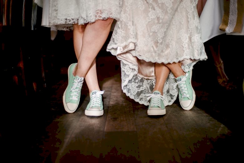 tennis shoes and wedding gowns