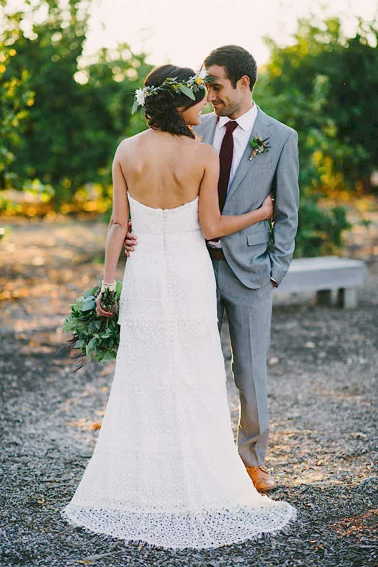 bride and groom in sun