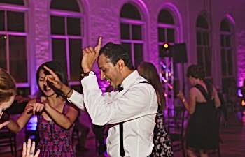 man dancing at wedding reception