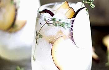 plum and thyme prosecco smash winter cocktail