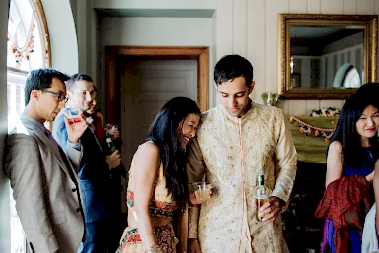 woman and man laughing at wedding