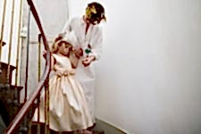 woman and child walking down the stairs