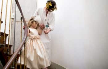 woman and child walking down the stairs