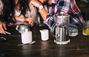 couple sitting together at coffee shop