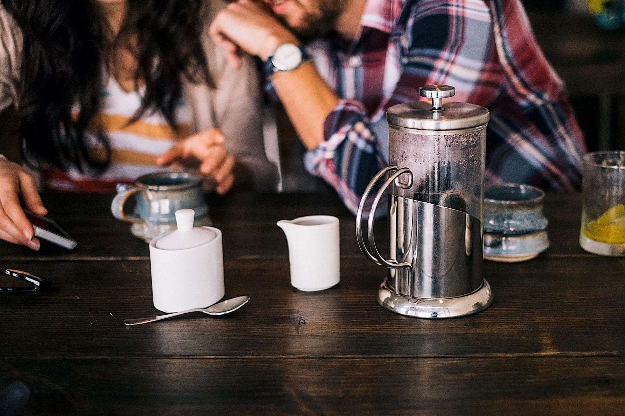 couple sitting together at coffee shop