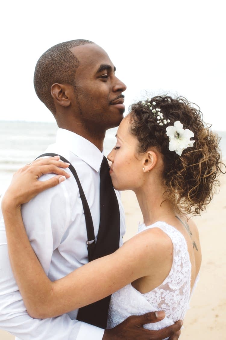 couple standing together at the beach