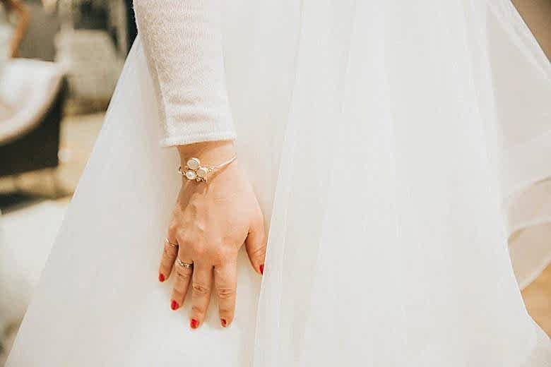 bride wearing bhldn wedding accessories