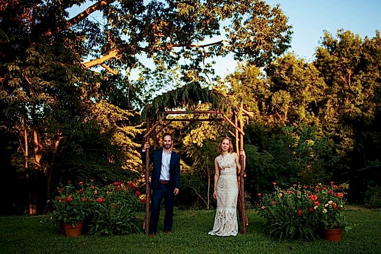 a couple on their wedding day by a lovely photo