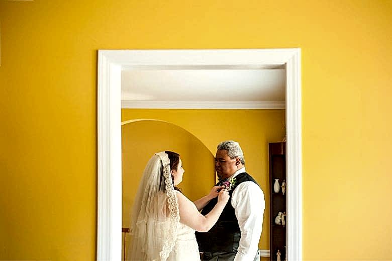 a couple getting ready for their wedding