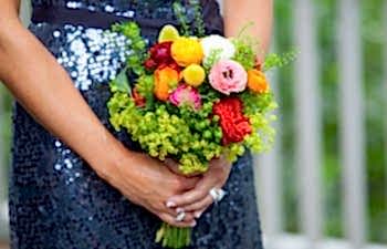 maid of honor holding a wedding bouquet
