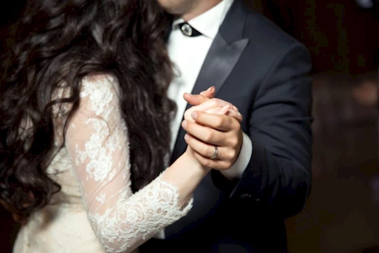 bride and groom dancing at their wedding reception