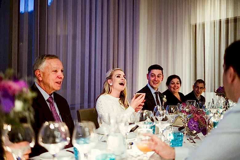 Bride and groom at dinner wedding reception