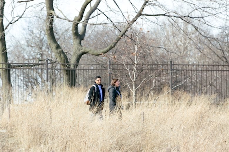 a couple walking before a surprise engagement