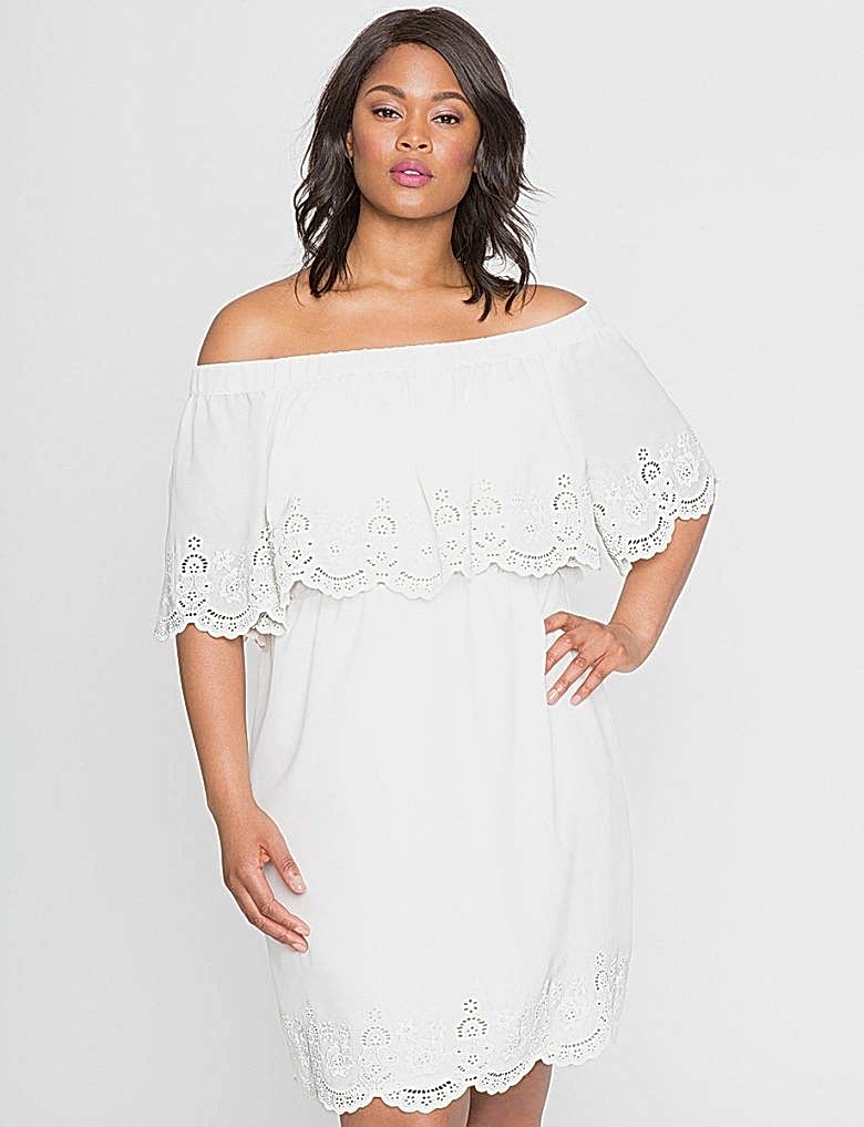 dropped shoulder ruffle mini dress with lace detail on woman