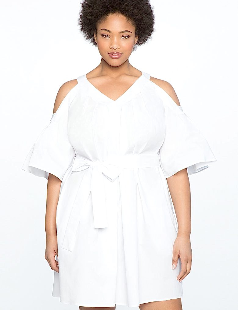 woman in cold shoulder white dress with looped belt
