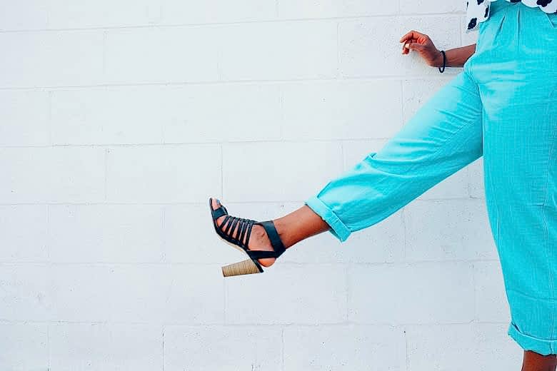 Woman in blue pants