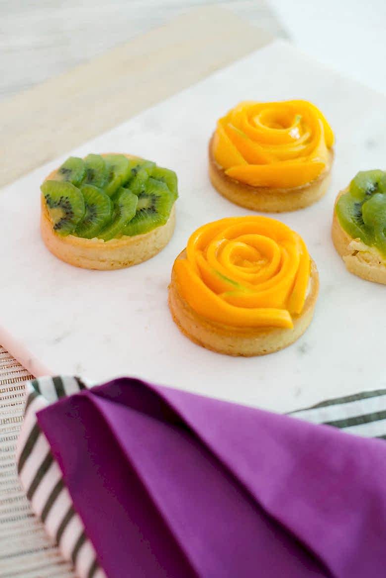 Fruit tarts on marble serving tray