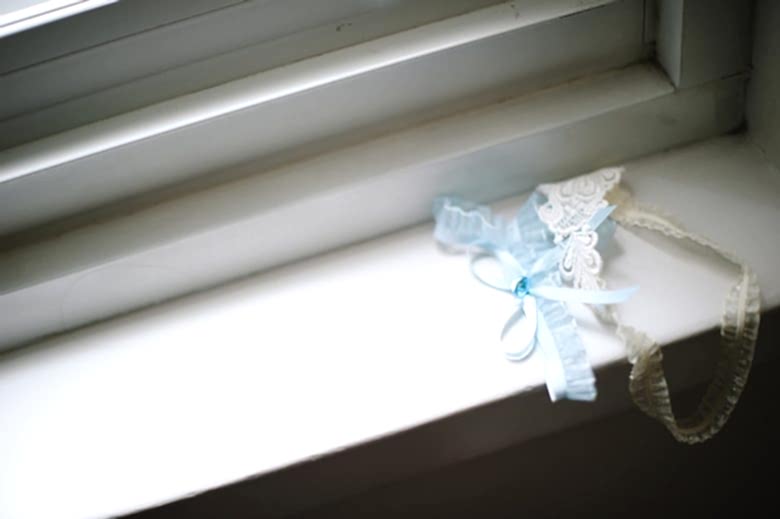 Blue and white garter on windowsill