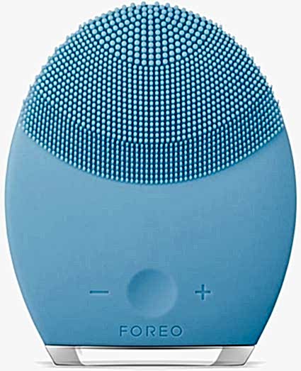 oval-shaped textured light blue face brush from Foreo