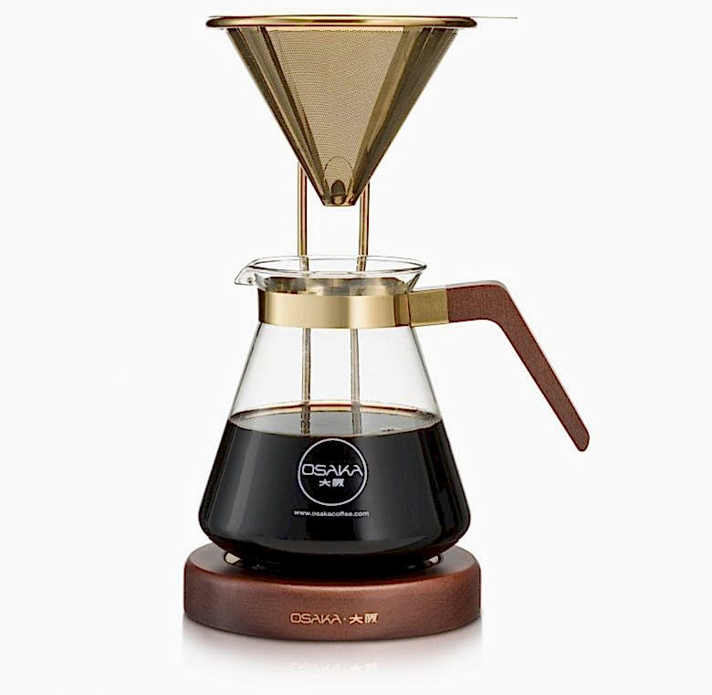 free standing gold pour over coffee brewer